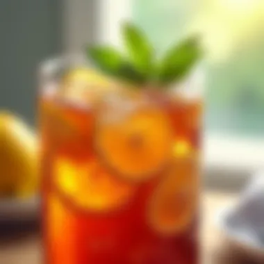 Close-up of freshly brewed iced tea with lemon slices and mint