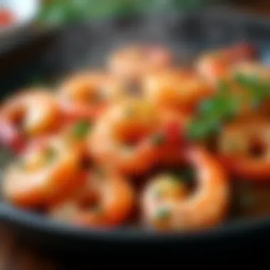 A close-up of shrimp being sautéed in a pan with aromatic herbs.